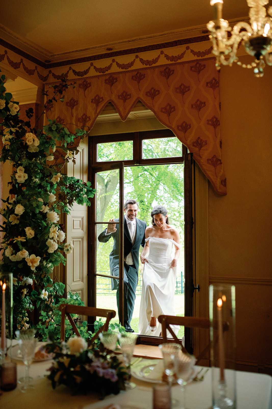 Couple walking into ballroom
